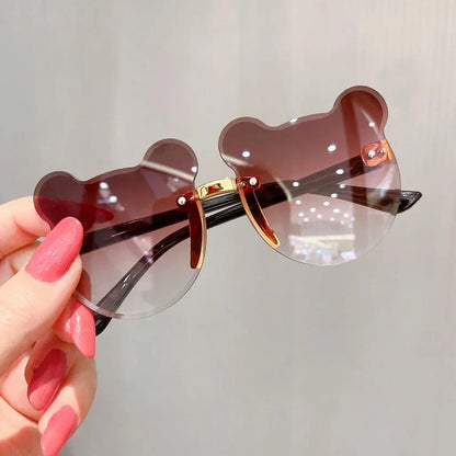 Boys and girls fashion glasses Children's sunglasses Cute baby anti-ultraviolet bear ears cartoon shape rimless frame glasses